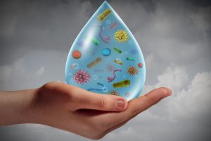 Hand holding Contaminated Water, Hand Lacerations